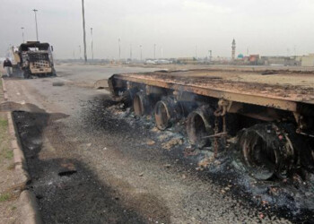 Unos camiones quemados en una autopista que comunica Faluya con Bagdad el 5 de enero de 2014.
AFP / SADAM EL MEHMEDY