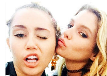Miley Cyrus y su
novia son sorprendidas
en apasionado beso