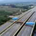 Aerial view of the Tienditas Bridge, in the border between Cucuta, Colombia and Tachira, Venezuela, after Venezuelan military forces blocked it with containers on February 6, 2019. - Venezuelan military officers blocked a bridge on the border with Colombia ahead of an anticipated humanitarian aid shipment, as opposition leader Juan Guaido stepped up his challenge to President Nicolas Maduro's authority. (Photo by EDINSON ESTUPINAN / AFP)