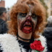 An enthusiast dressed as a zombie takes part in the traditional Zombie Parade in Kiev on October 26, 2019, to celebrate Halloween. (Photo by Sergei SUPINSKY / AFP)