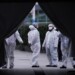 Staff members wearing protective masks are seen at the Shanghai railway station in Shanghai, China, as the country is hit by an outbreak of a new coronavirus, February 7, 2020. REUTERS/Aly Song