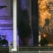 Pope Francis (R) gives the Urbi et Orbi Blessing next to a miraculous crucifix (L) that in 1552 was carried in a procession around Rome to stop the great plague, that was brought from the San Marcello al Corso church in Rome, after presiding over a moment of prayer on the sagrato of St Peterís Basilica, the platform at the top of the steps immediately in front of the faÁade of the Church, on March 27, 2020 at the Vatican. (Photo by Vincenzo PINTO / AFP)