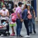 People wear face masks near the Venezuelan-Colombia border after the Colombian government decided to close the Simon Bolivar international bridge as a preventive measure in response to the spreading coronavirus disease (COVID-19) in San Antonio, Tachira, Venezuela March 14, 2020. REUTERS/Carlos Eduardo Ramirez     TPX IMAGES OF THE DAY