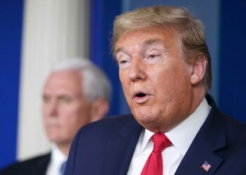 (FILES) In this file photo US President Donald Trump speaks, flanked by US Vice President Mike Pence, during the daily briefing on the novel coronavirus, COVID-19, at the White House on March 24, 2020, in Washington, DC. - US President Donald Trump on March 25, 2020 praised Japan's decision to delay the Tokyo Olympics over the coronavirus pandemic and indicated he will attend the rescheduled games next year. "Congratulations to Prime Minister Abe of Japan, and the IOC, on their very wise decision to present the Olympics in 2021," Trump tweeted. "It will be a great success, and I look forward to being there!" (Photo by MANDEL NGAN / AFP)