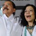 Nicaraguan President Daniel Ortega (L) celebrates with First Lady Rosario Murillo after receiving the credentials in Managua on January 9, 2012, a day before his re-inauguration. AFP PHOTO/Rodrigo ARANGUA (Photo credit should read RODRIGO ARANGUA/AFP/Getty Images)