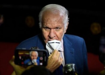 The new vice-president and rector of the National Electoral Council (CNE), Rafael Simon Jimenez, talks to the press after the inauguration of the CNE's new authorities, at the Supreme Tribunal of Justice headquarters in Caracas on June 12, 2020. (Photo by Federico PARRA / AFP)